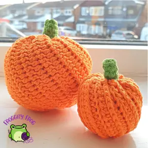 Swirled Pumpkins displayed by a window