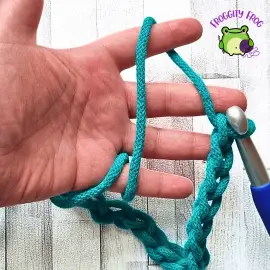 Holding your yarn to control your tension