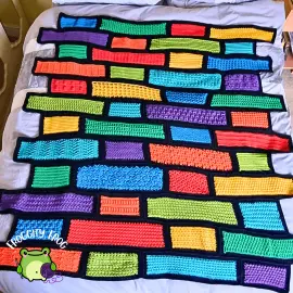 The Wall Of Stitches On A Bed